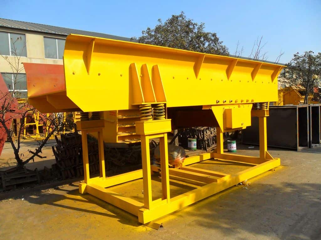 Sistem Mesin Vibrating Feeder